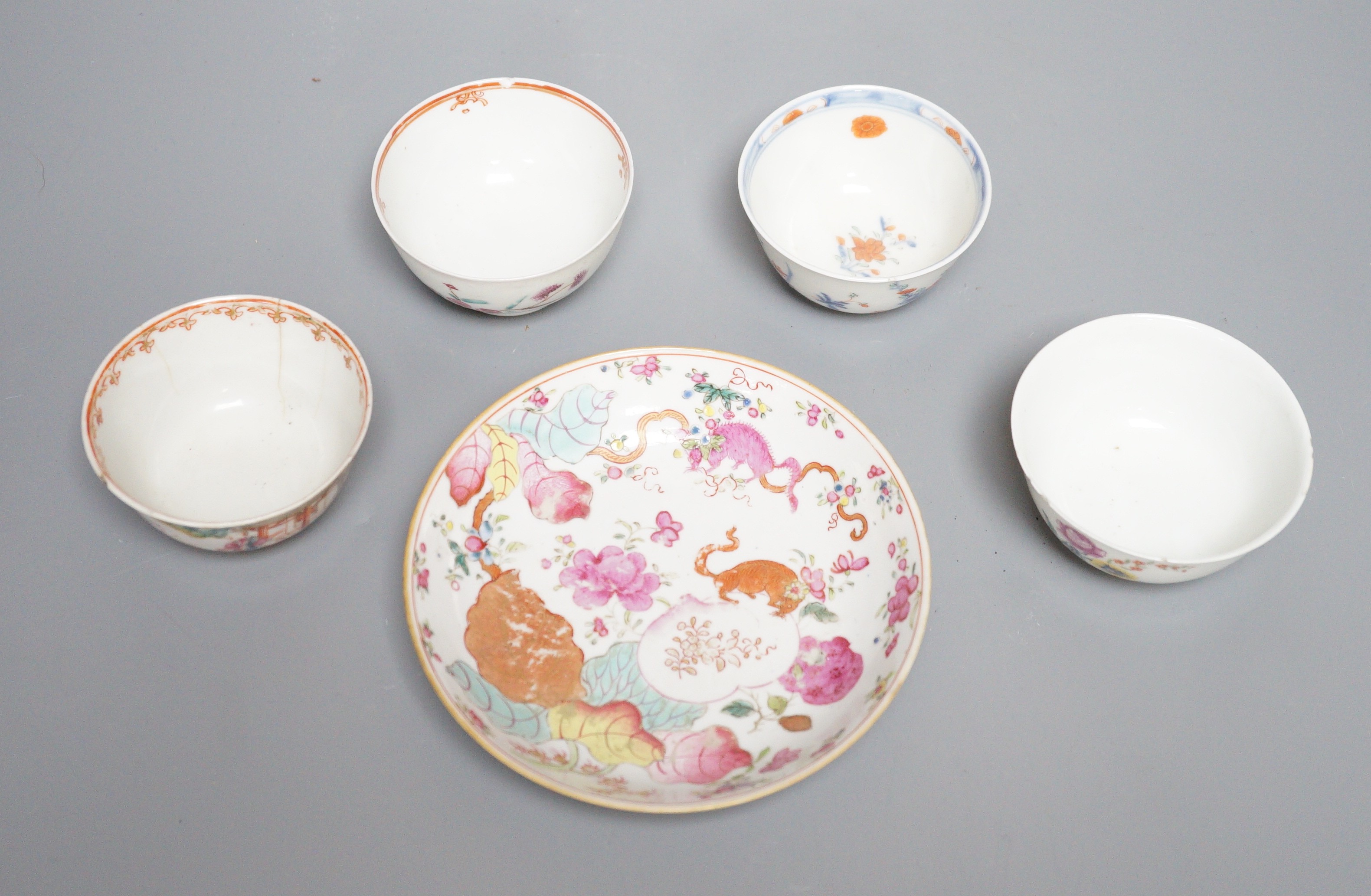 A 19th century Chinese Tobacco Leaf pattern saucer and four various teabowls